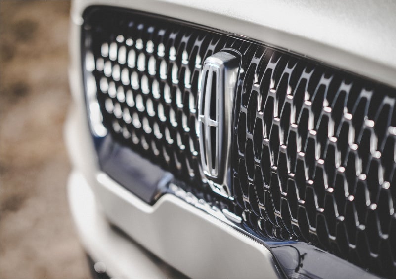The grille of the 2023 Lincoln Aviator® Reserve model with an eye-catching repeated field of Lincoln Star logo shapes | Seekins Lincoln in Fairbanks AK
