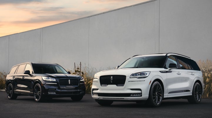 Two Lincoln Aviator® SUVs are shown with the available Jet Appearance Package | Seekins Lincoln in Fairbanks AK