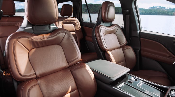 The front row's Perfect Position Seats in a 2024 Lincoln Aviator® Reserve model with Ebony Roast interior | Seekins Lincoln in Fairbanks AK