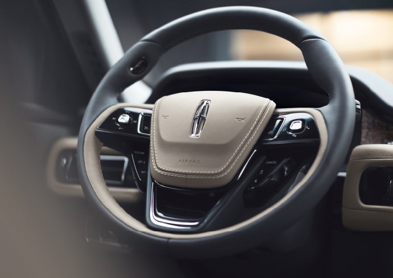 The intuitively placed controls of the steering wheel on a 2024 Lincoln Aviator® SUV | Seekins Lincoln in Fairbanks AK