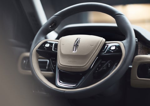 The intuitively placed controls of the steering wheel on a 2024 Lincoln Aviator® SUV | Seekins Lincoln in Fairbanks AK