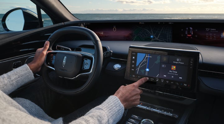 The driver of a 2024 Lincoln Nautilus® SUV interacts with the new Lincoln Digital Experience. | Seekins Lincoln in Fairbanks AK