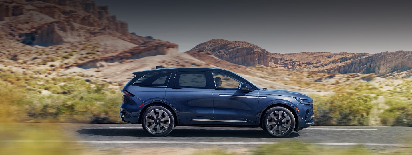 A 2024 Lincoln Nautilus® SUV is being driven in a desert setting. | Seekins Lincoln in Fairbanks AK