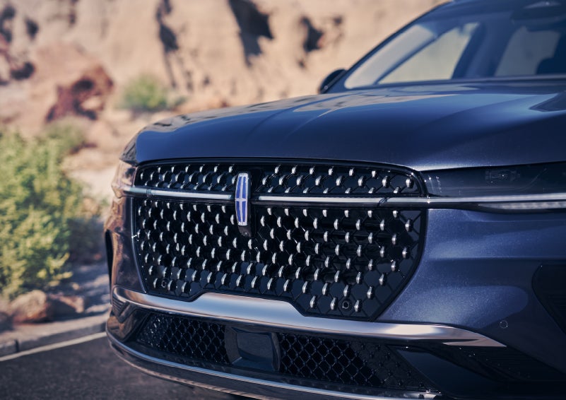 The stylish grille of a 2024 Lincoln Nautilus® SUV sparkles in the sunlight. | Seekins Lincoln in Fairbanks AK