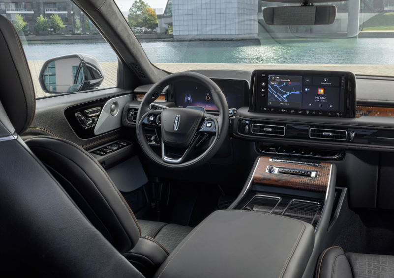 The interior of the 2025 Lincoln Aviator® SUV is shown parked with a view of a harbor through the windshield. | Seekins Lincoln in Fairbanks AK