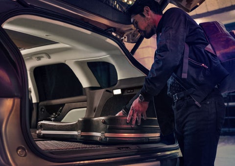 The driver of a 2024 Lincoln Corsair® SUV is shown selecting the drive mode. | Seekins Lincoln in Fairbanks AK