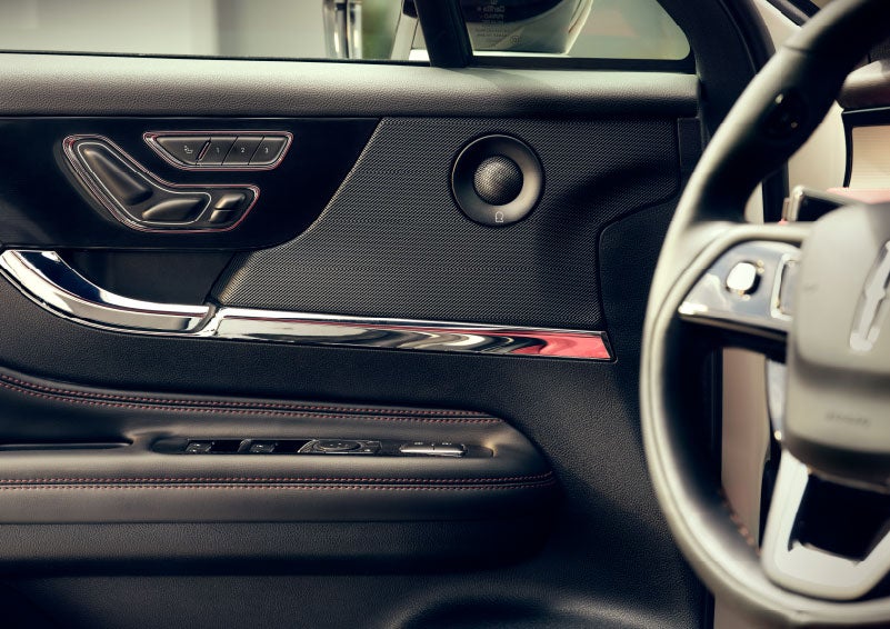 An audio speaker is shown in the driver's side door of a 2024 Lincoln Corsair® SUV. | Seekins Lincoln in Fairbanks AK