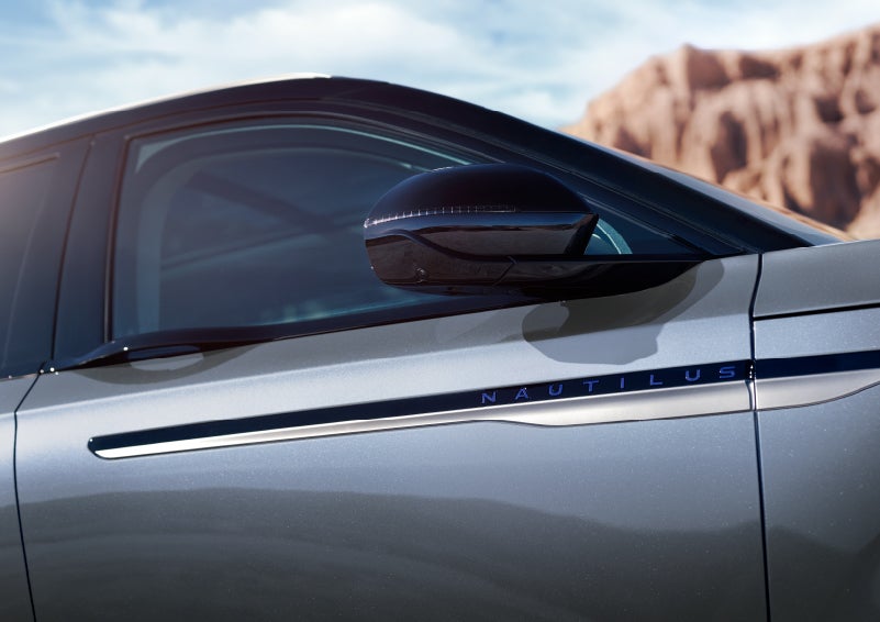 Blue lettering on the side of the vehicle that reads nautilus indicates the available hybrid powertrain. | Seekins Lincoln in Fairbanks AK