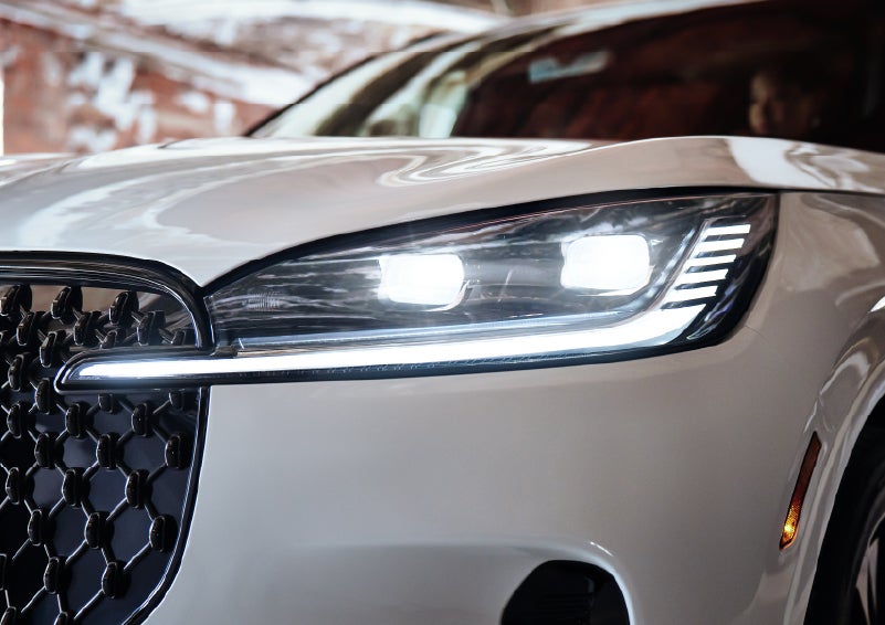 A close-up of a headlamp on the 2026 Lincoln Aviator® SUV is shown. | Seekins Lincoln in Fairbanks AK