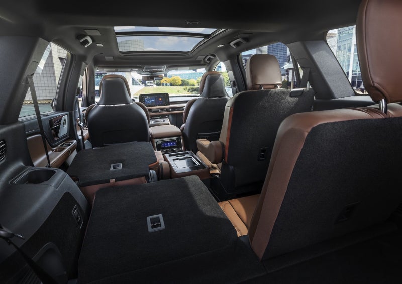 One side of the PowerFold® third-row seat and a second-row seat are folded forward in the 2026 Lincoln Aviator® SUV. | Seekins Lincoln in Fairbanks AK