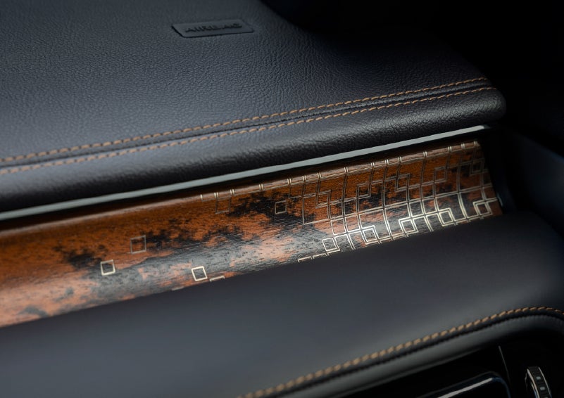 A close-up shot of the 2026 Lincoln Aviator® dashboard with unique black and brown accents and brown stitching. | Seekins Lincoln in Fairbanks AK