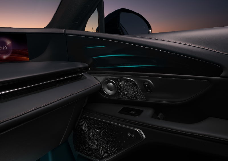 Selectable ambient lighting glows in the passenger door panel. | Seekins Lincoln in Fairbanks AK