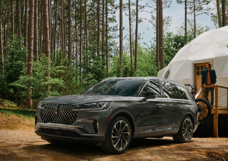 A 2027 Lincoln Aviator® is parked next to a high end glamping site. | Seekins Lincoln in Fairbanks AK